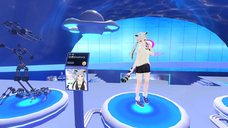 Philip’s Sheep, a bar with a cyberpunk and aquarium theme. Hakama no Kitsune’s animal-themed model, Amatora, is on display. She has ears and a tail that looks similar to a raccoon’s.