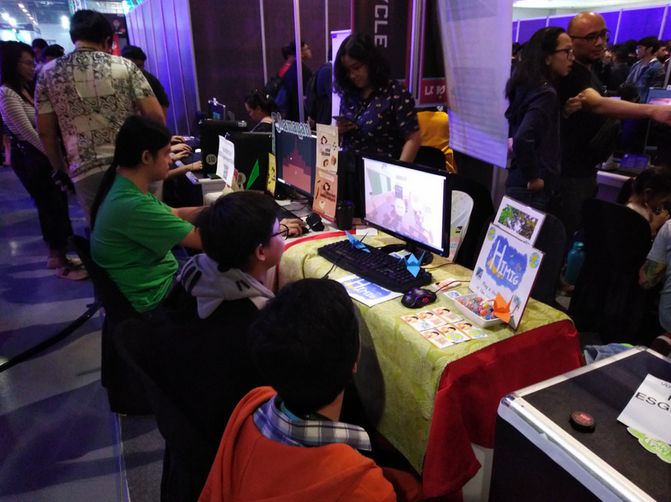 A kid playing at the Himig booth.